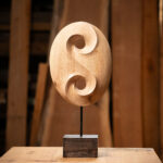 Talla en madera. Norte-Sur. Platano. 23x50x12. Gubiarte